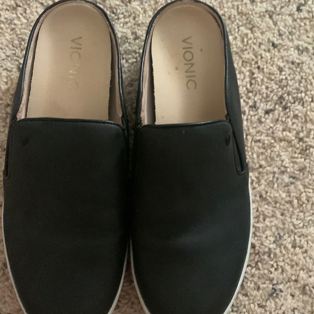 Hardly worn black slip ons